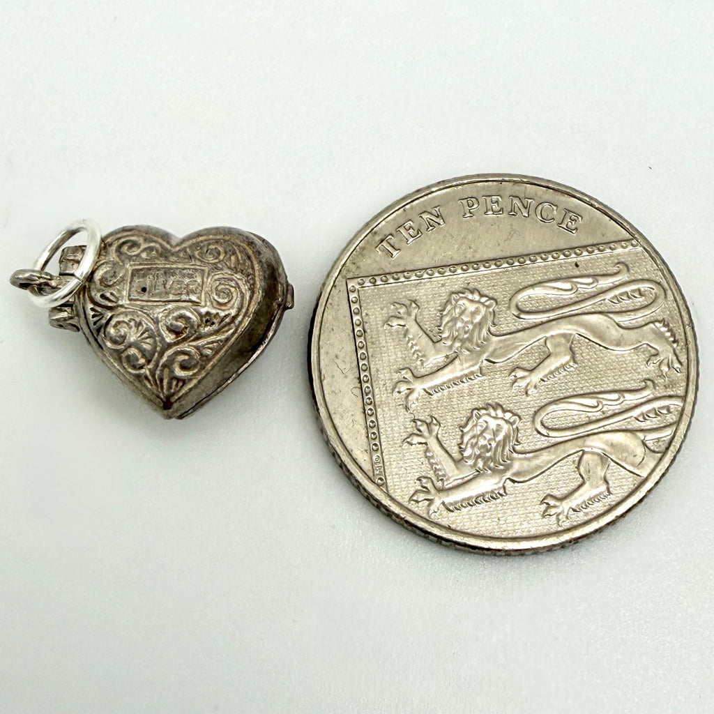 Vintage Sterling Silver couple in an opening heart Charm