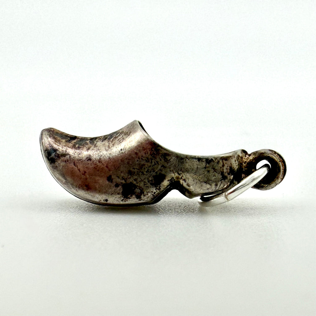 Top view showing the open interior of the vintage silver Dutch clog charm