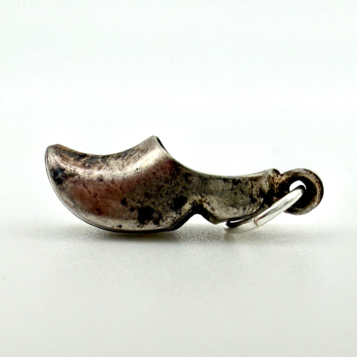 Top view showing the open interior of the vintage silver Dutch clog charm