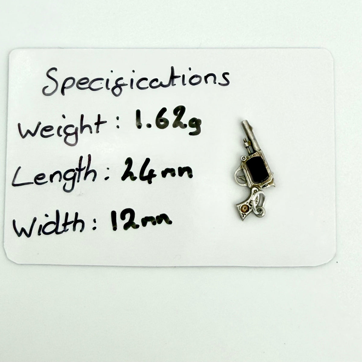 Vintage Sterling Silver revolver Charm