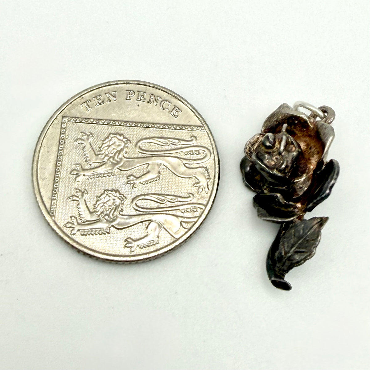 Vintage Sterling Silver articulated rose charm