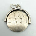 Front view of the sterling silver spinning I Love You fob charm