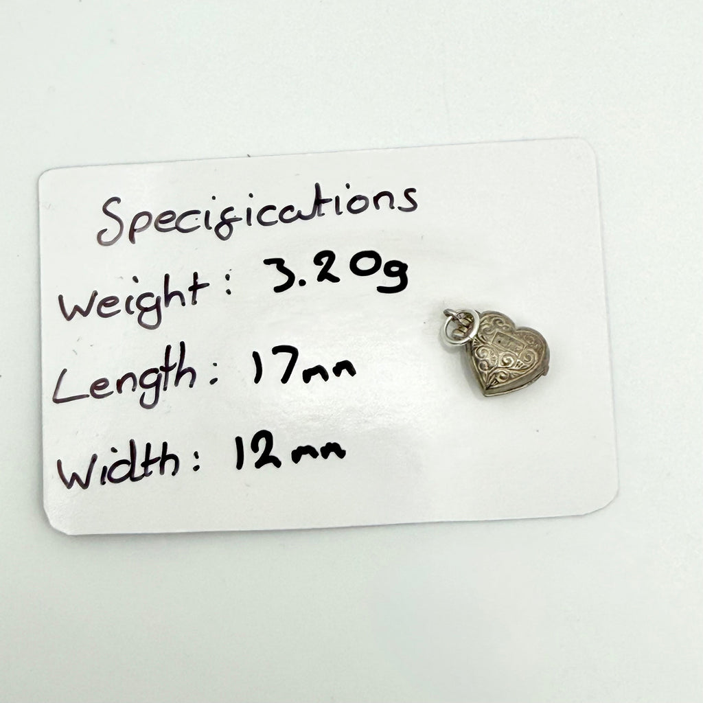Vintage Sterling Silver couple in an opening heart Charm