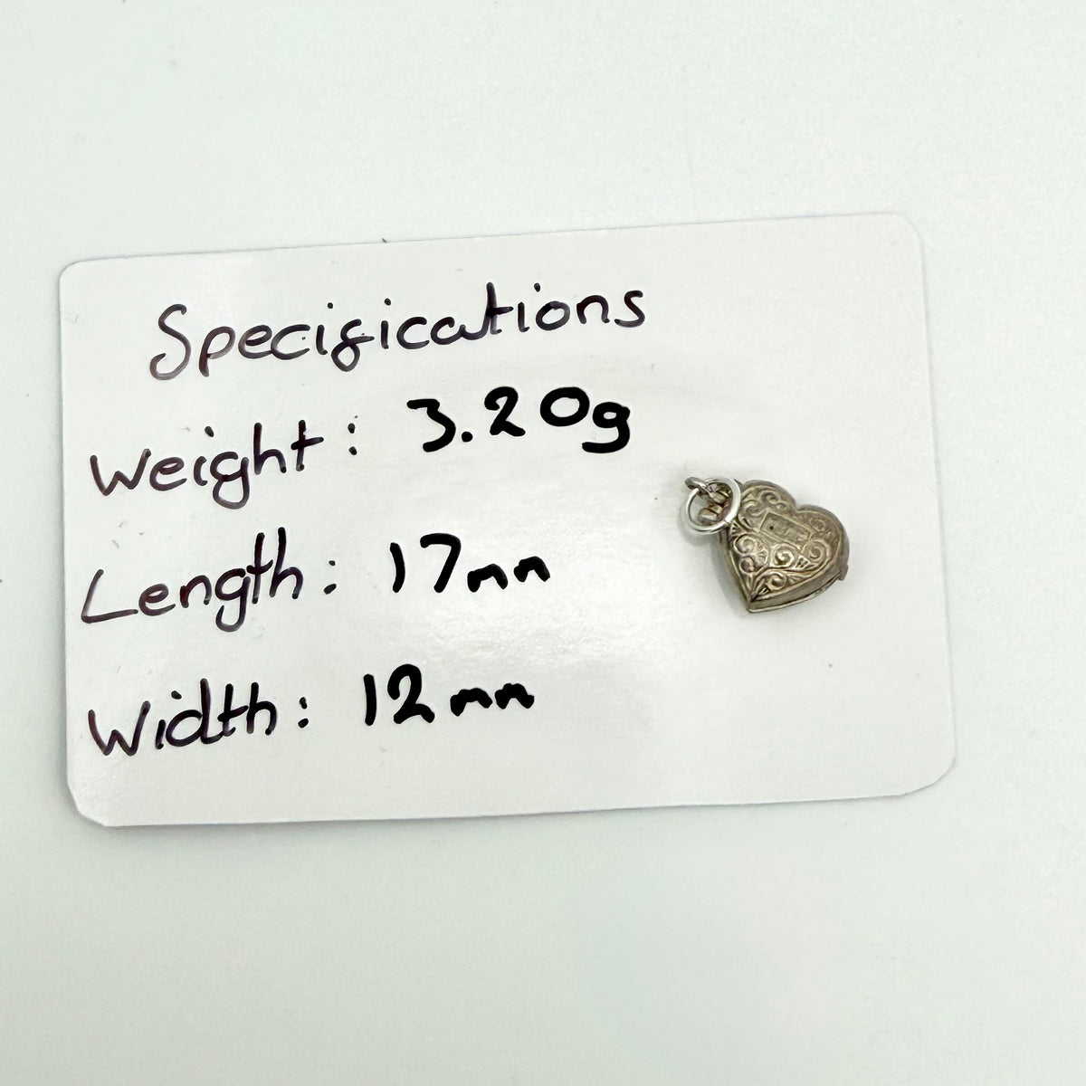 Vintage Sterling Silver couple in an opening heart Charm
