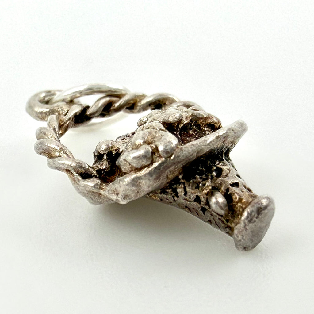 Vintage Sterling Silver Flower Basket Charm. border, photographed on a clean white background.